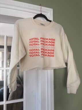 Women's Cropped Cream Sweatshirt with Red 'TOTAL PACKAGE' Graphic